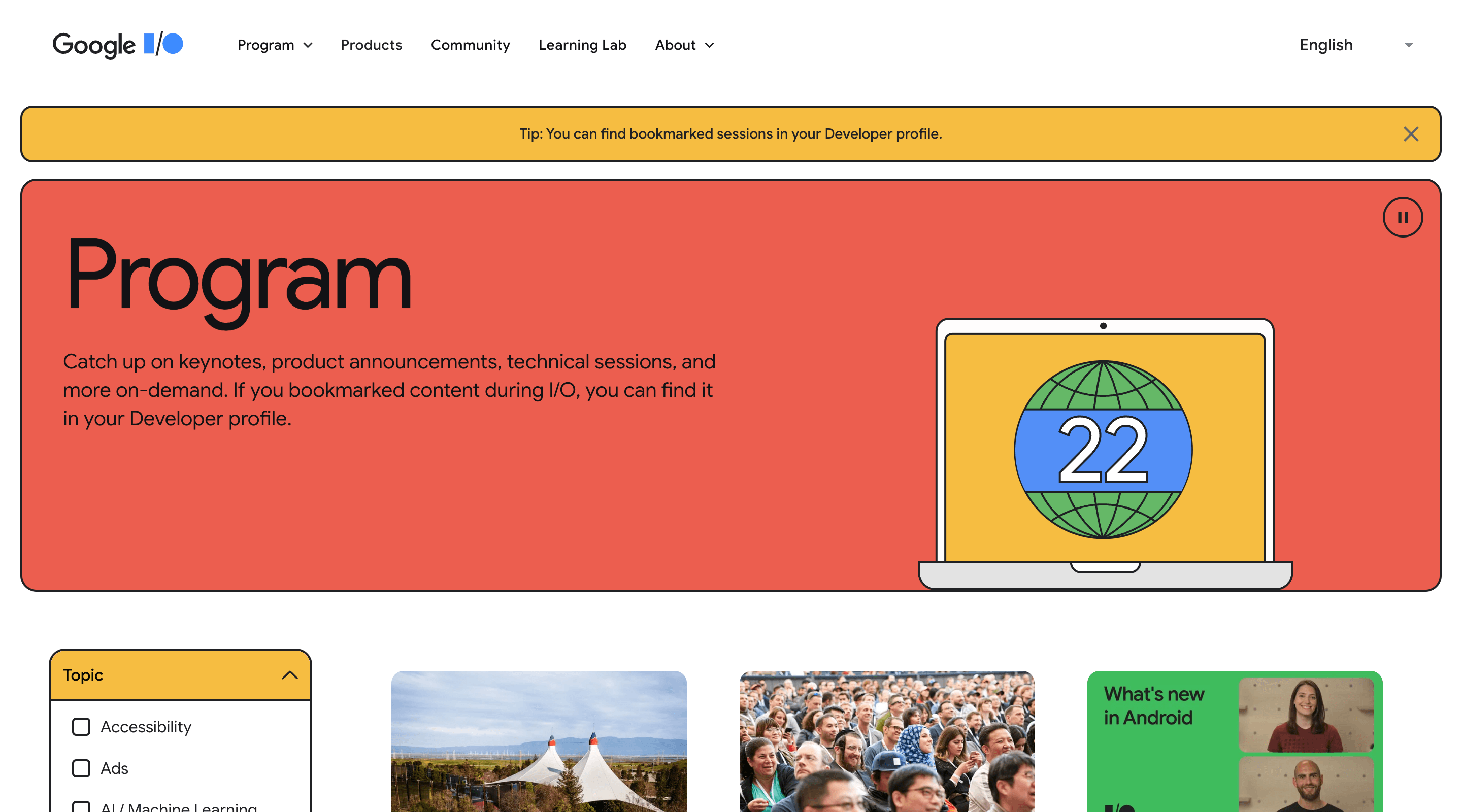 Screenshot of the Google I/O 2022 'Program' page. The header contains the Google I/O logo, the main navigation, and a language selector. The hero section contains an introduction paragraph and an illustration of a laptop with the number '22' on the screen.